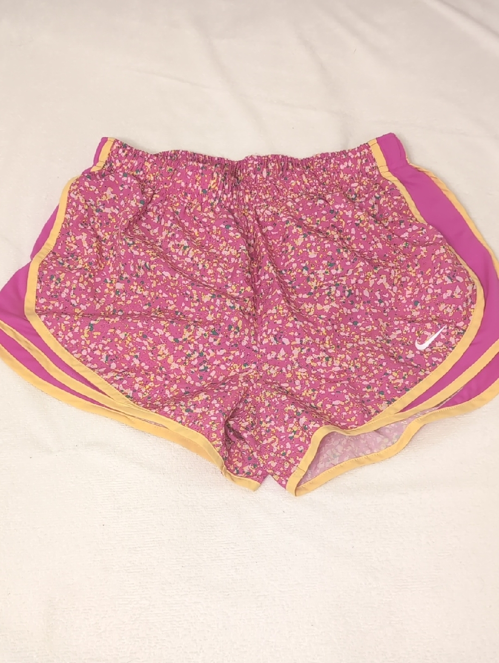 Nike Women’s Pink Floral Athletic Shorts with Yellow Trim